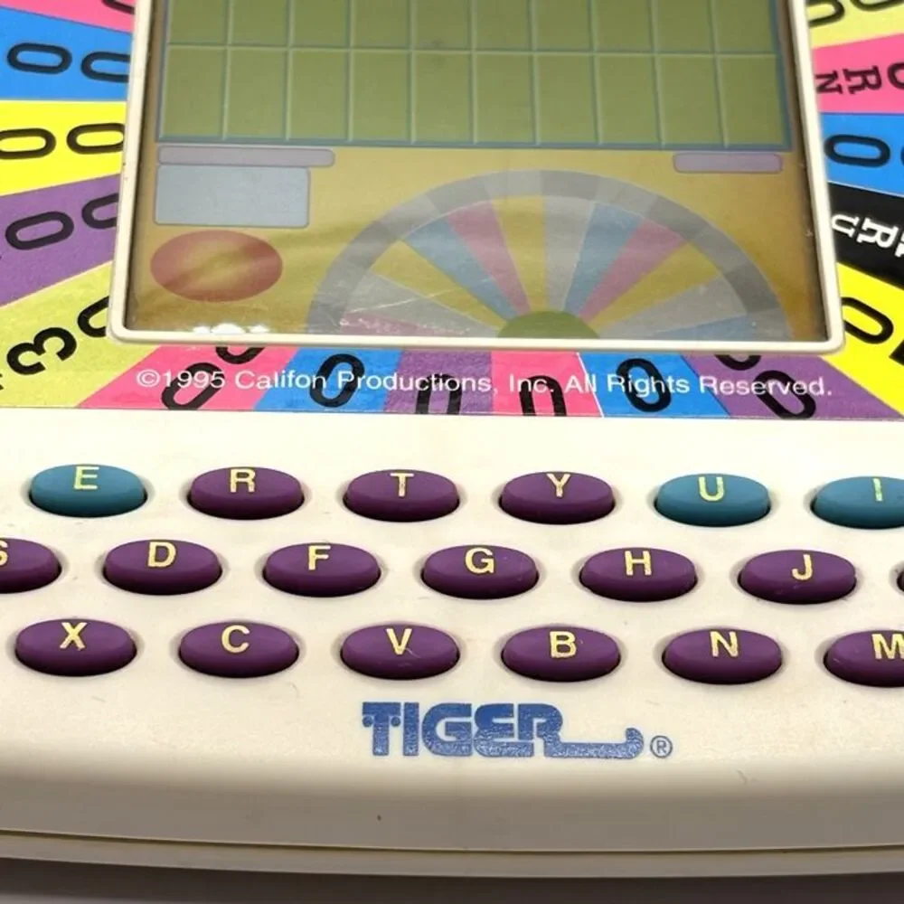 Vintage Wheel of Fortune Electronic Game w/ Cartridge Complete Works Tiger 1995